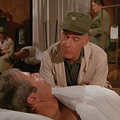 Capt. Norman Traeger, M.D., Col. Spiker